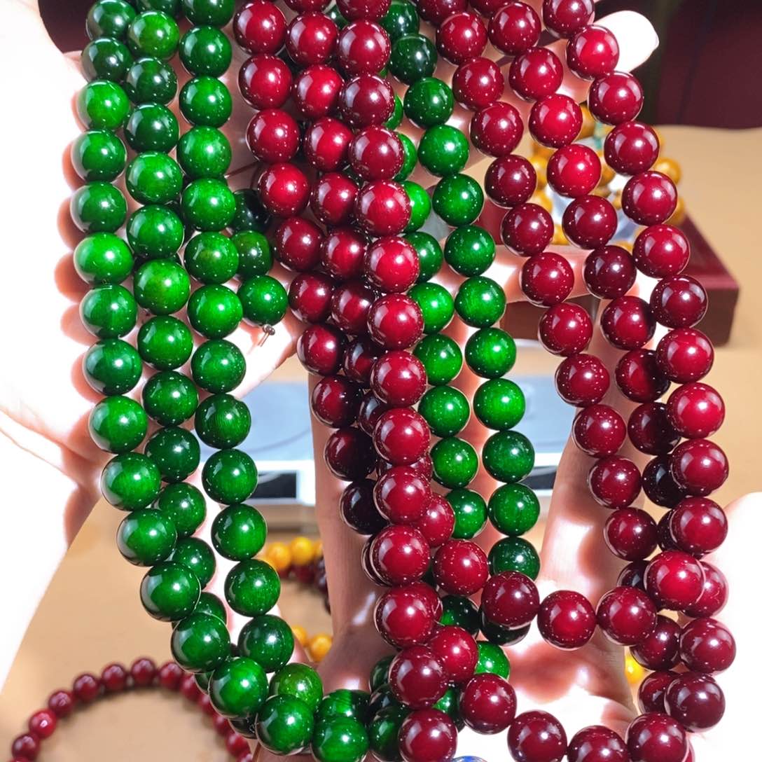 贝壳杉阿*帝王血龙木1.0/108颗颗，两串