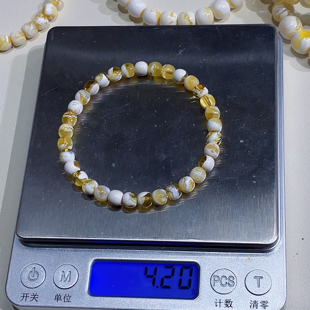 咚***咚琥珀未镶嵌裸石金白6m