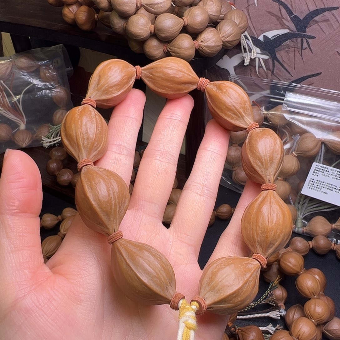 孤****橄榄核吊坠橄榄核四花