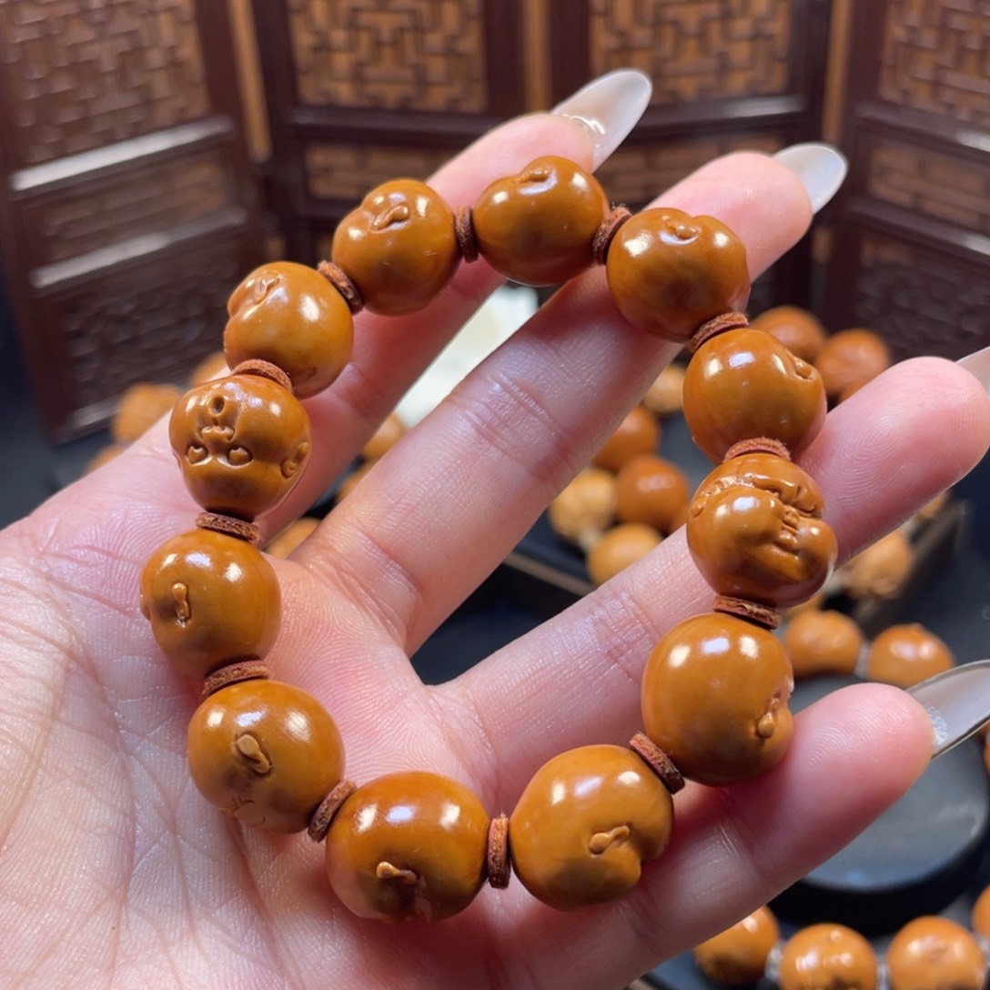 达***剑橄榄核吊坠恶人生百态