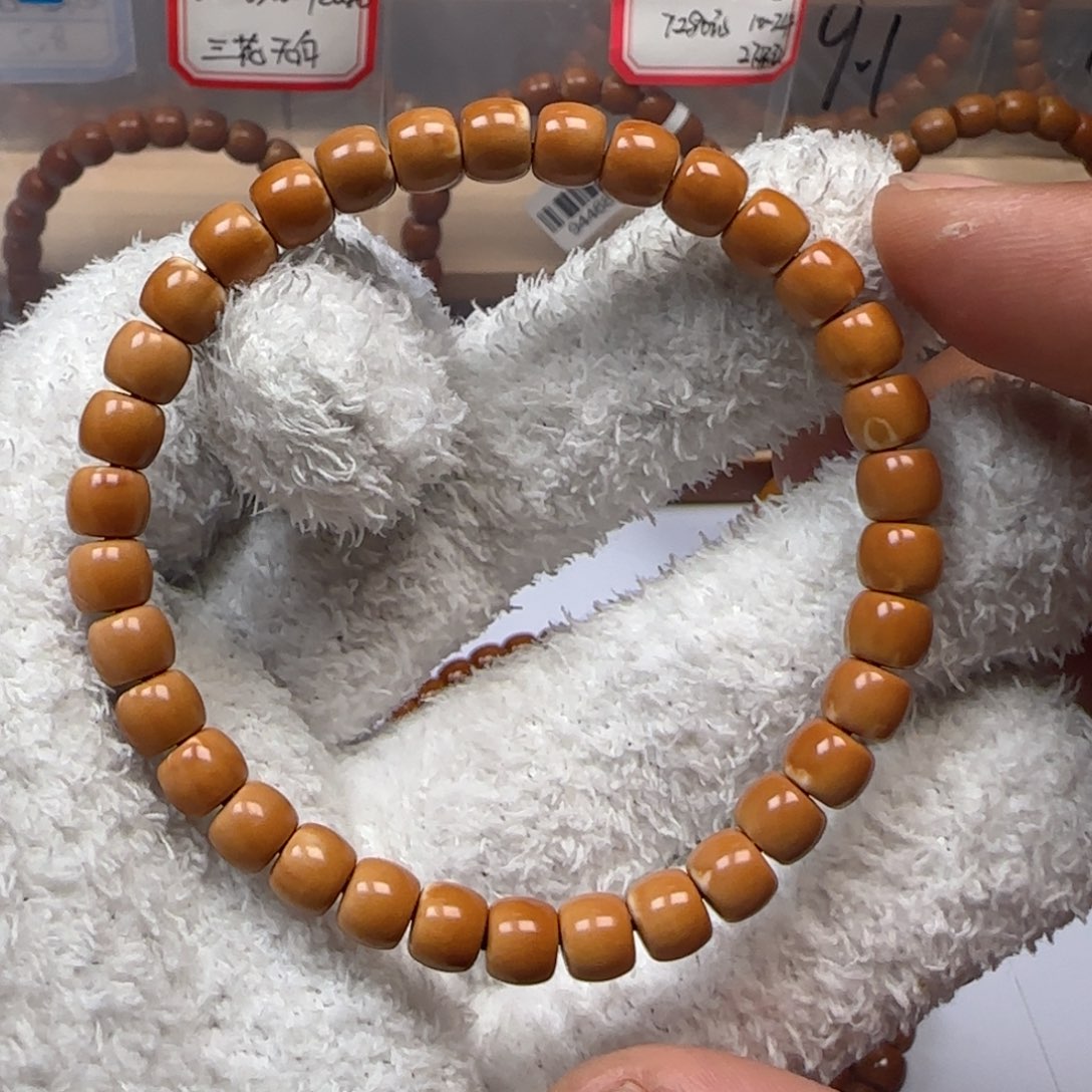 橄榄核手串老挝6.7mm三花单圈