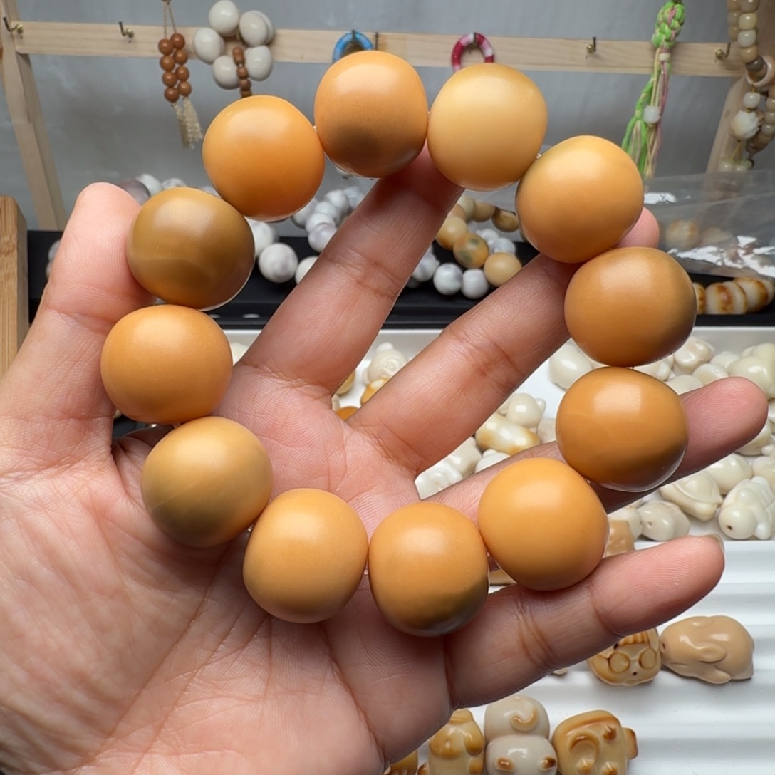 淡***然手串菩提根/象牙果22左右干磨瑕疵