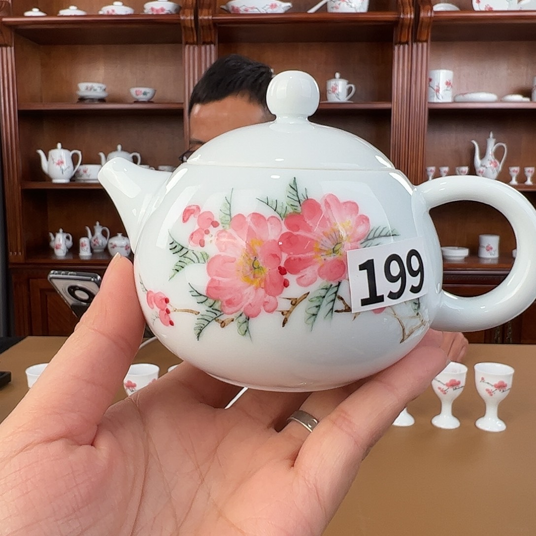 湦***湦瓷釉下水点桃花小茶壶，微瑕