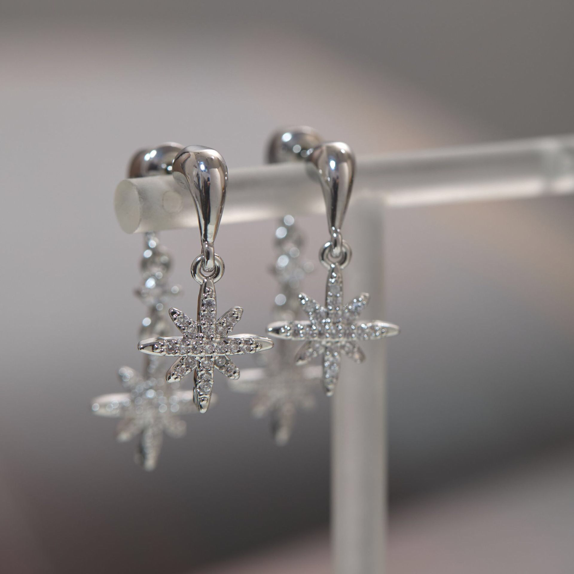 铜合金耳饰 度假风锆石八芒星耳环爆款轻奢个性耳饰蚊香盘耳夹女