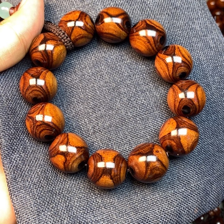 玉***莲黄花梨/降香黄檀2.0紫油梨对眼对眼