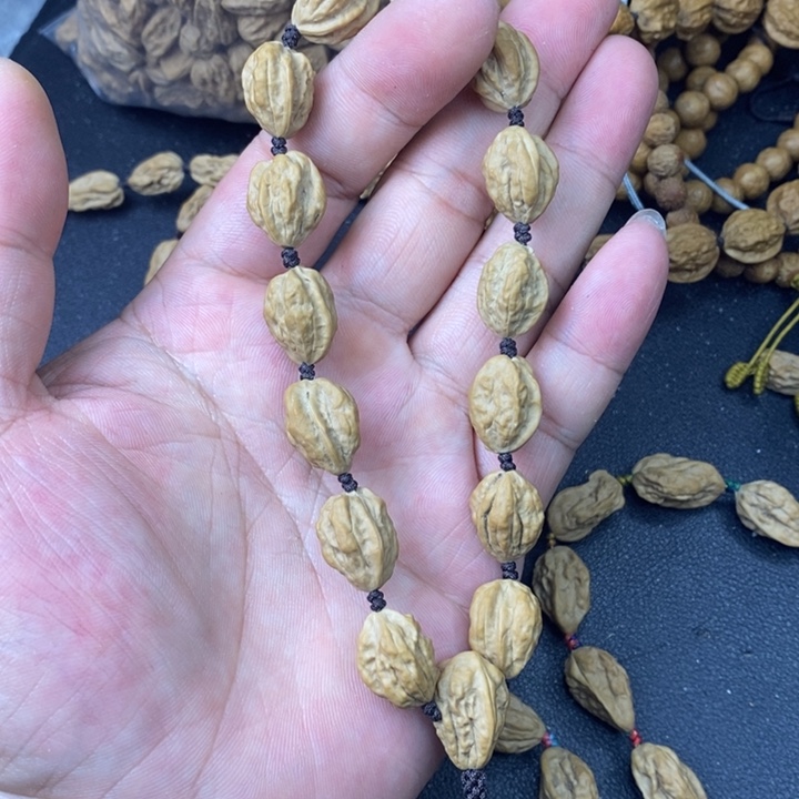 洛***y核桃文玩木质核桃手串