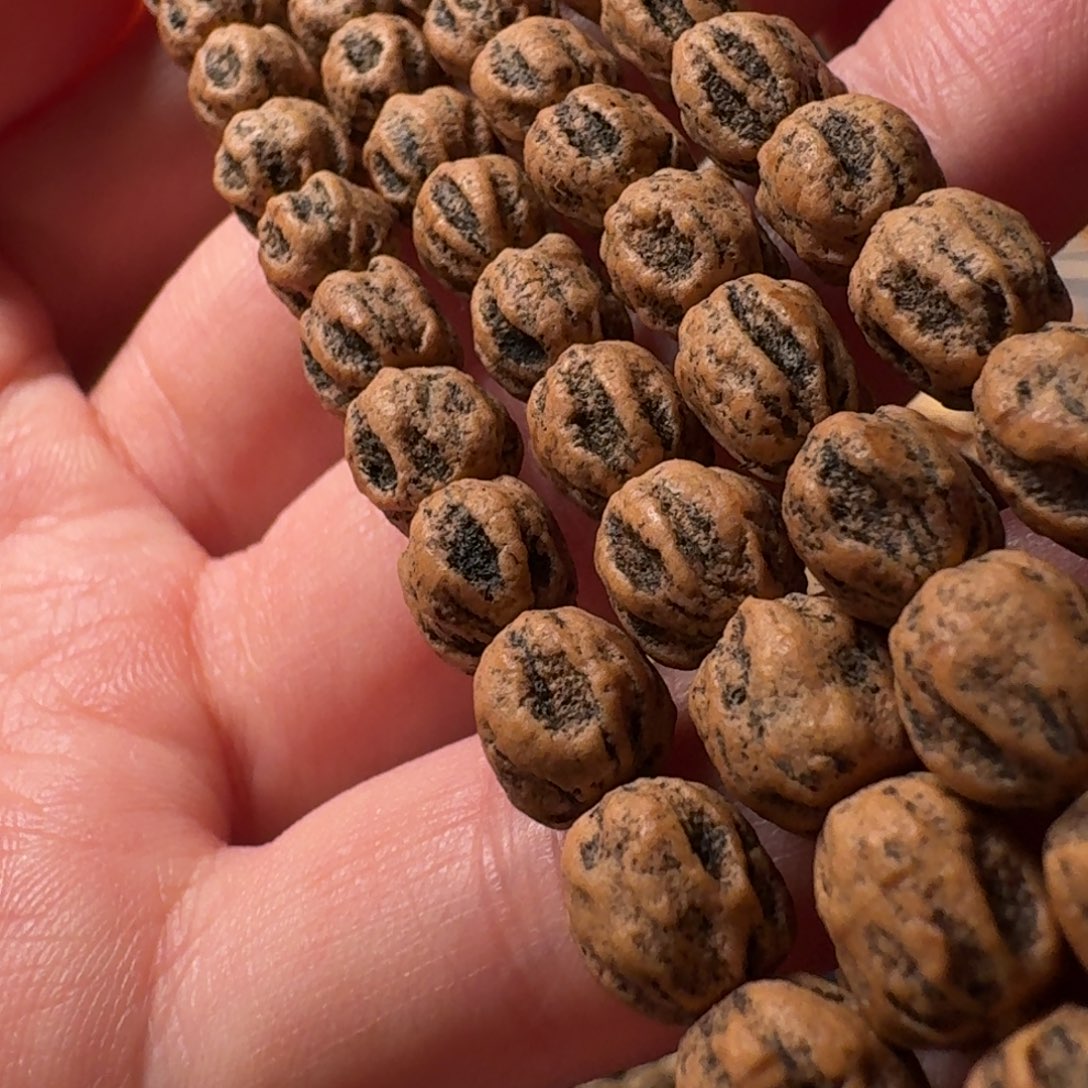 宇***o柏香籽/百香籽吊坠