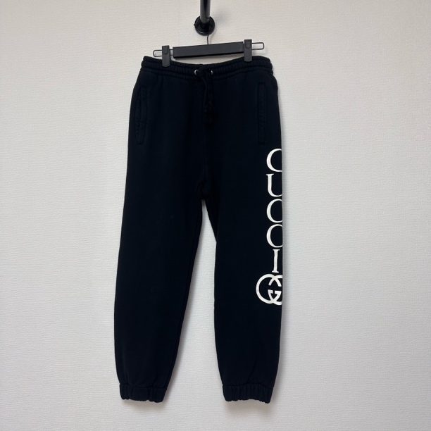 99新 GUCCI/古驰 黑色侧logo卫裤/XS