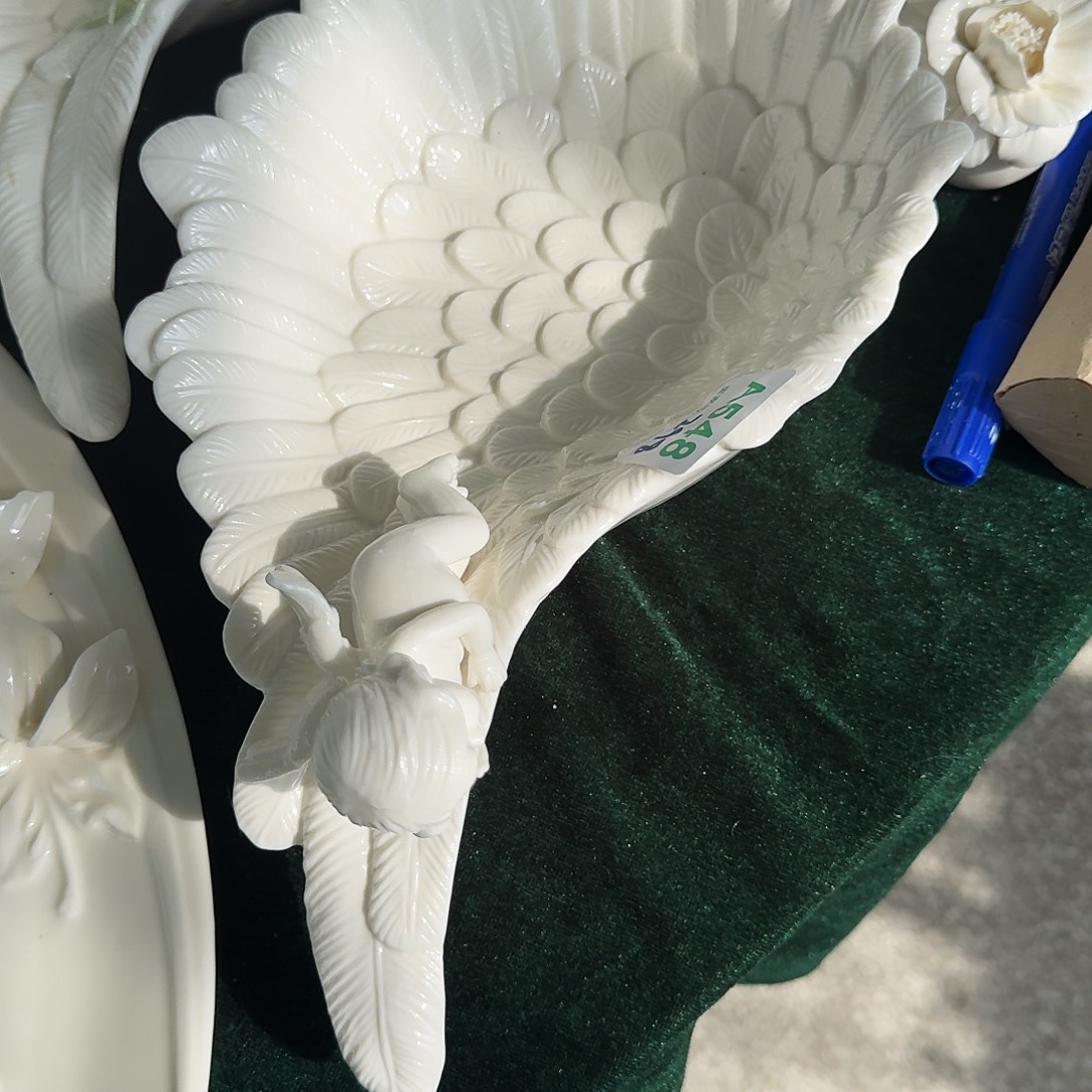 看***乖瑕疵裂口小天使羽毛盘