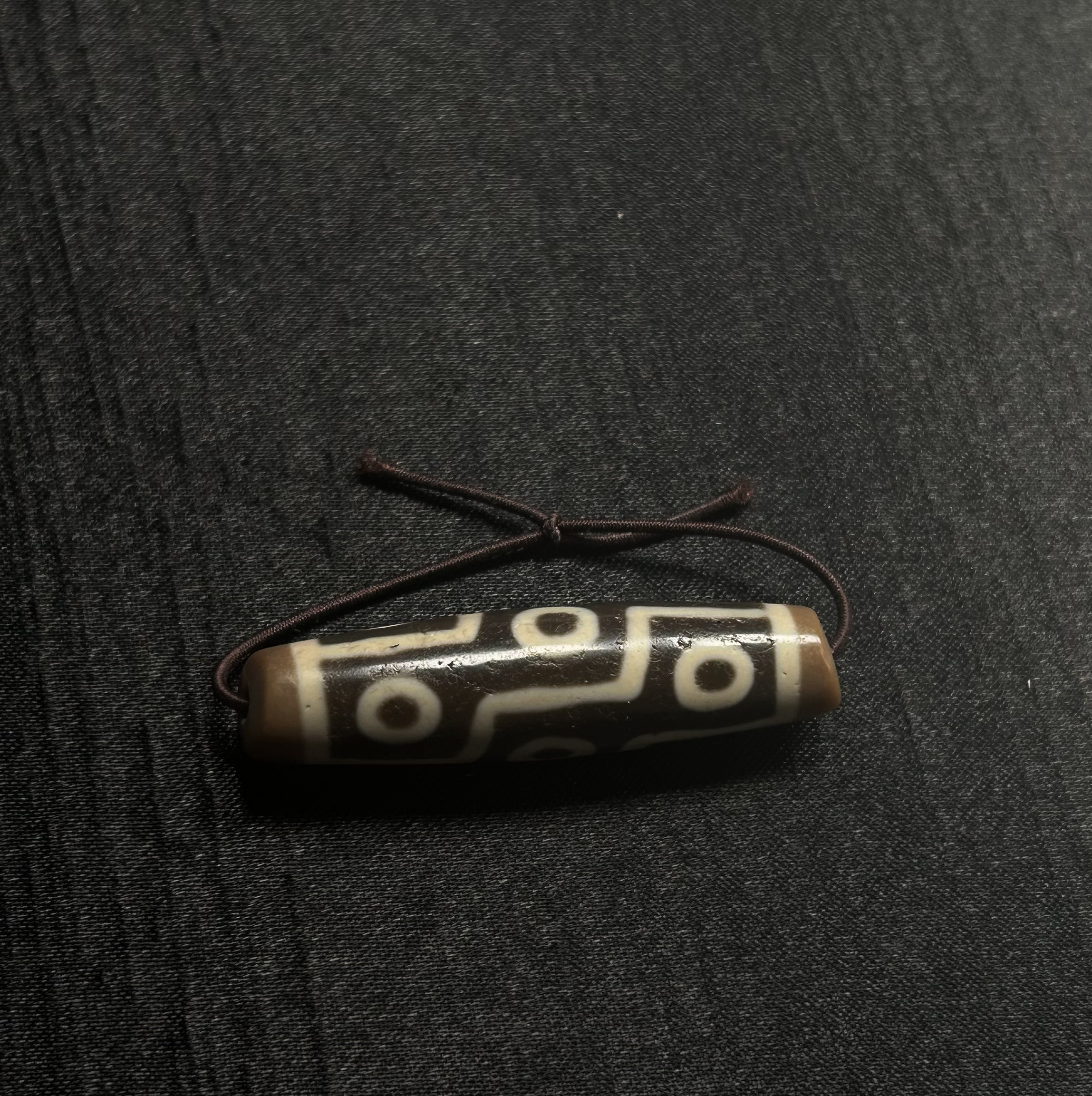 张奎页岩牙黄手工折线九眼玛瑙45*12