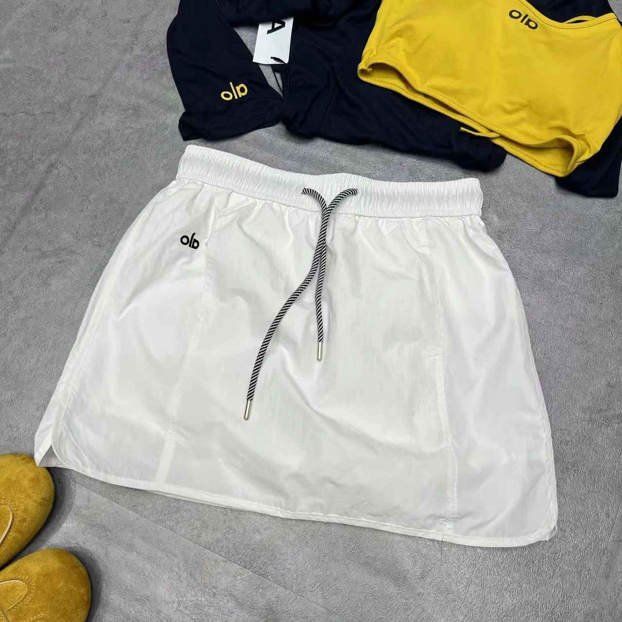 【妙女郎】alo速干休闲半身裙