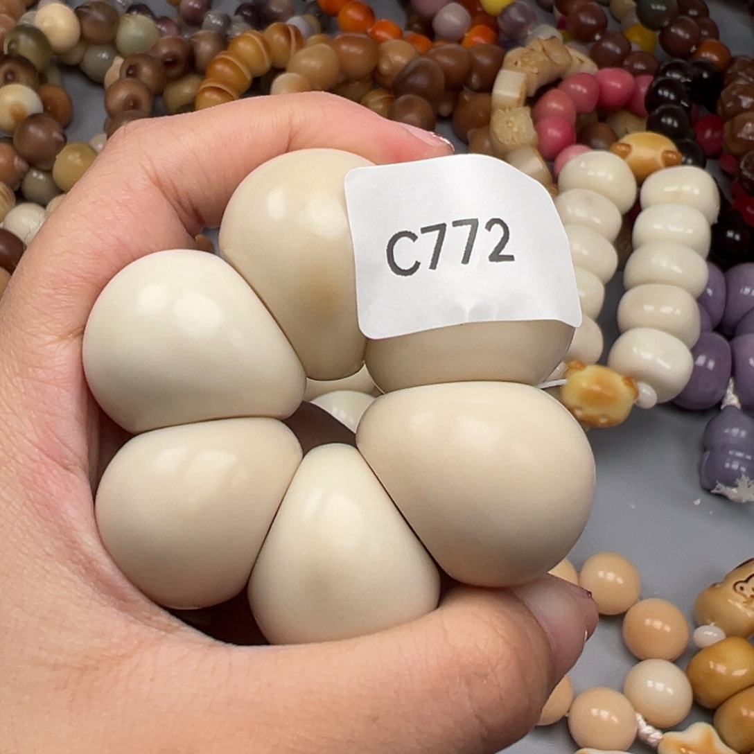 n***t吊坠菩提根/象牙果C772蒜瓣23-27瑕疵一串