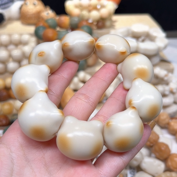 菩提根/象牙果手串猫头1.23 46微瑕