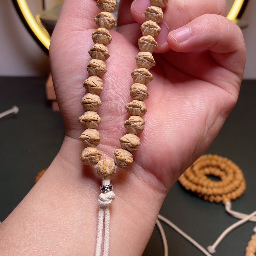 柏香籽/百香籽吊坠奥*曼凤眼手持