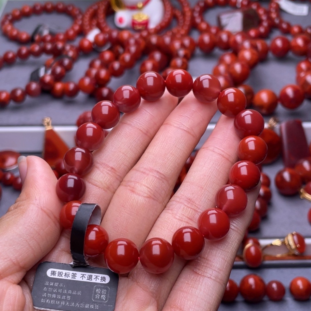 凡***训南红玛瑙未镶嵌其他天然原矿）10加瓦西玫瑰红圆珠手串