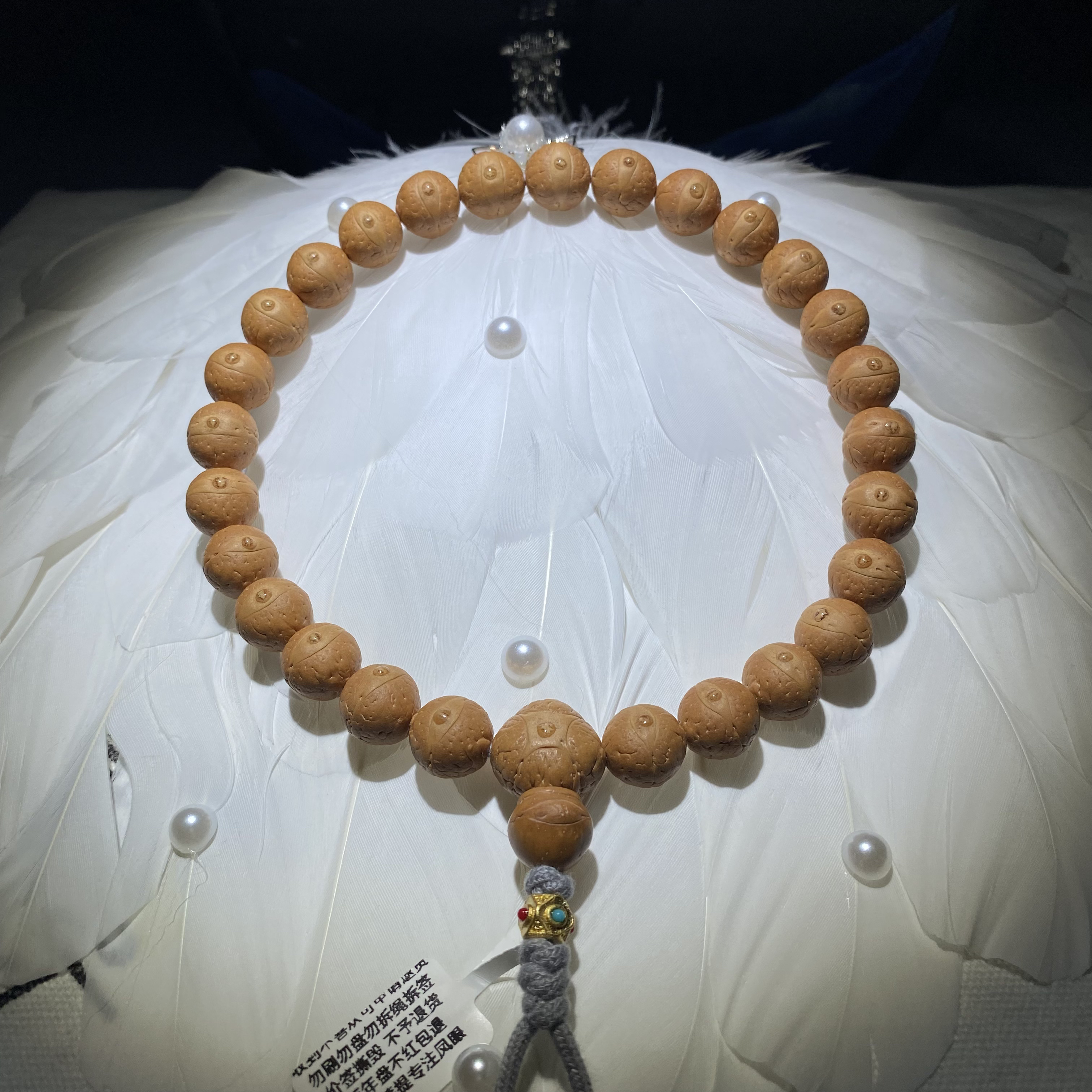 99号尼泊尔凤眼，尺寸12.4-7毫米27颗大手持一图一物已打底封眼