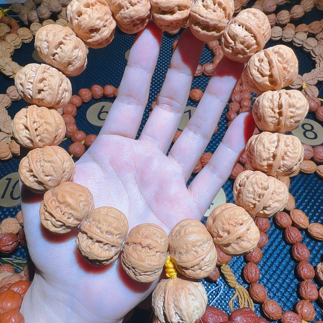 尖*哥文玩核桃吊坠磨盘元宝京八棱白茬手持