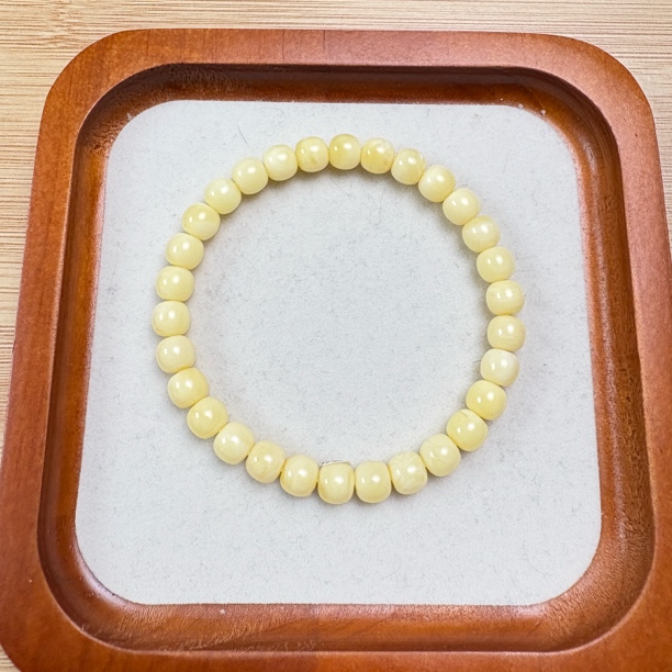 7x6.5mm6.09 高桩嘎嘎归圆俄料原矿蜜蜡手串  有质检证书保真