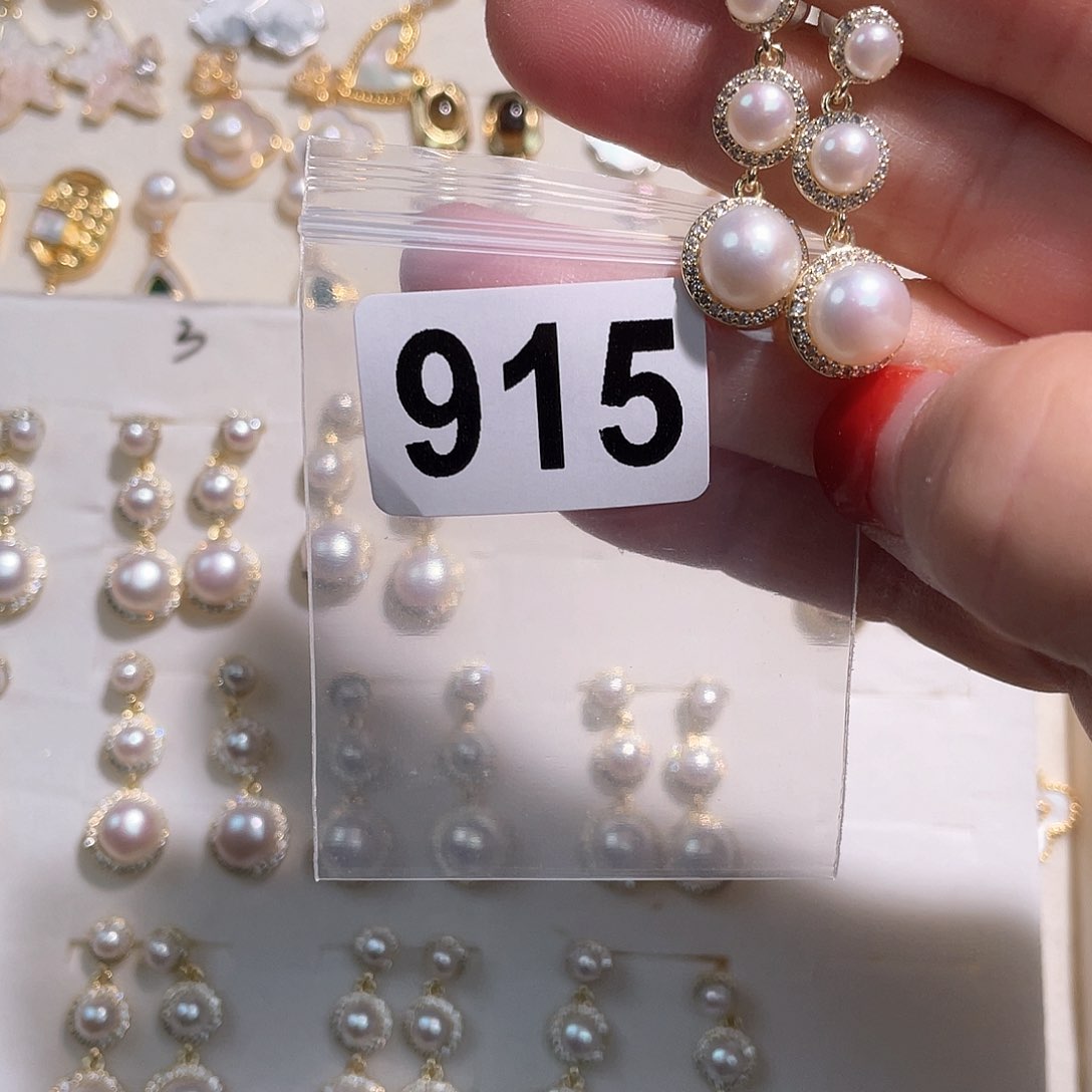 淡水珍珠耳饰合金九**光