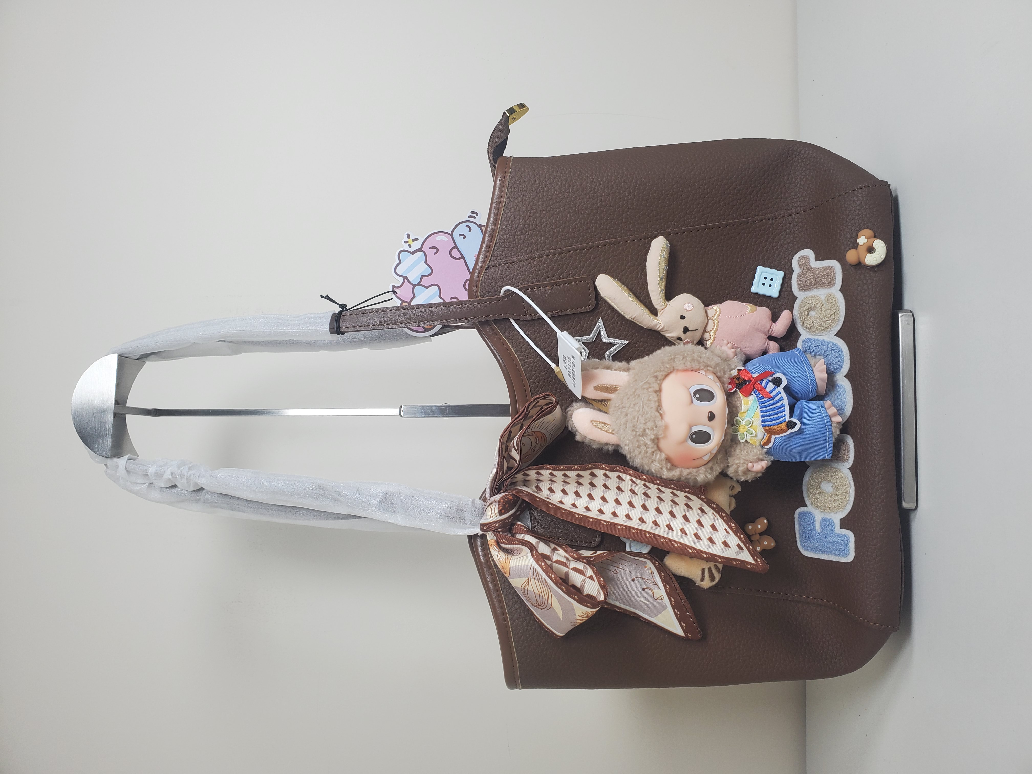 泡泡玛特LABUBU马卡龙坐坐指定IP潮玩包包明款