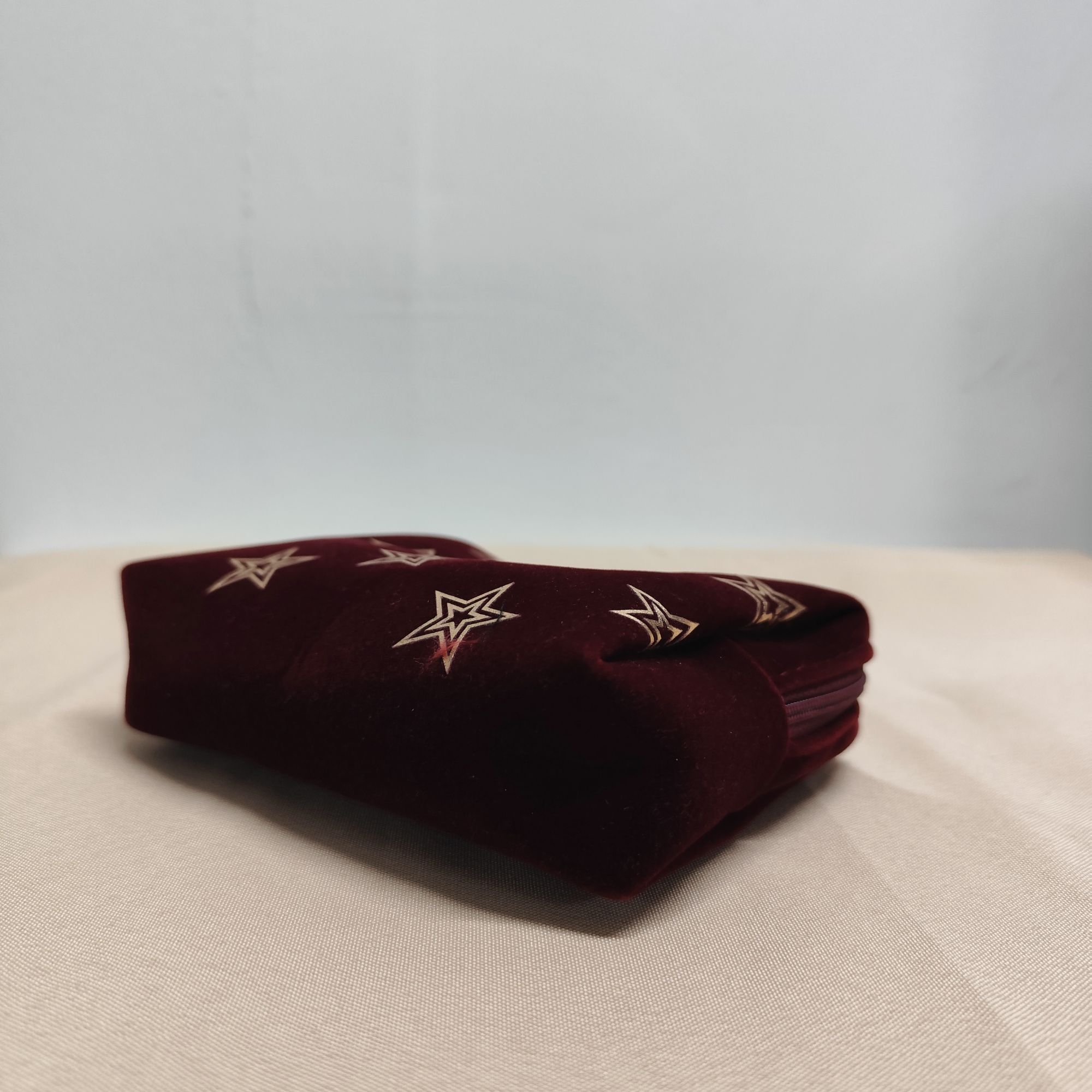 小C那个T啊~酒红色星星化妆包推荐