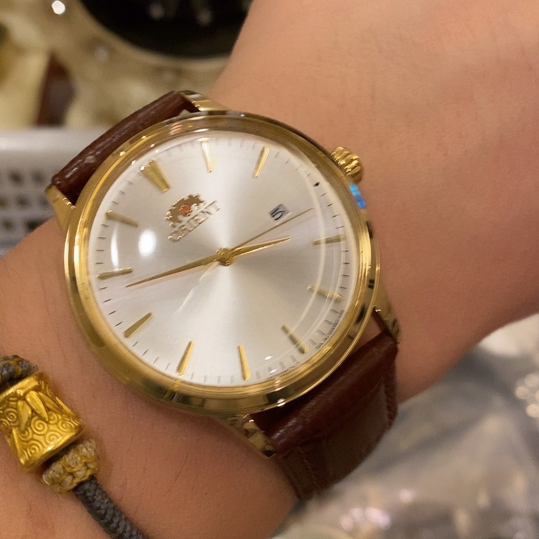 精钢东方双狮大脸猫腕表