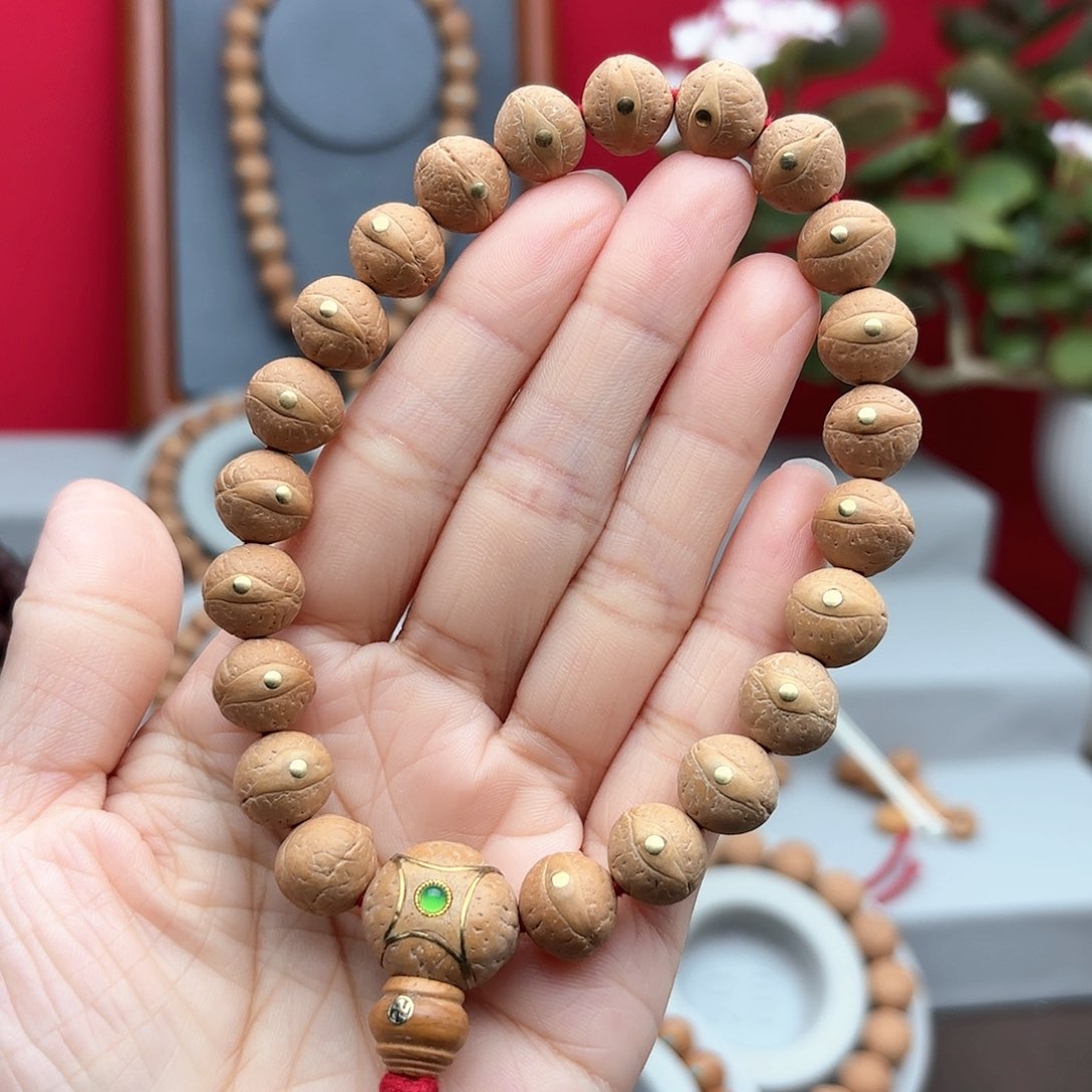 凤眼菩提手串11.5左右铜钉镶嵌手串