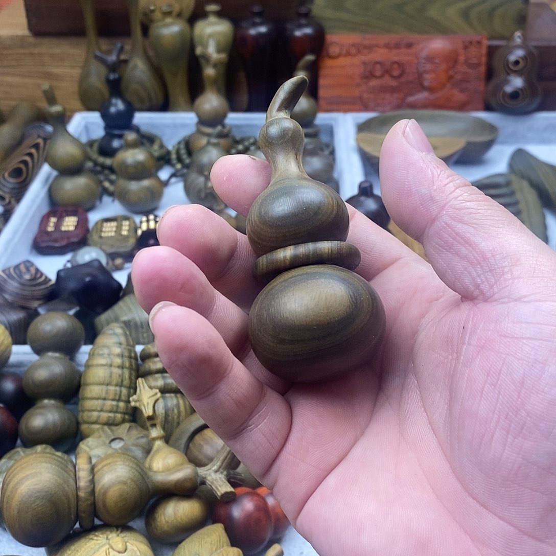 h***6香榧木阿根廷绿檀手把件