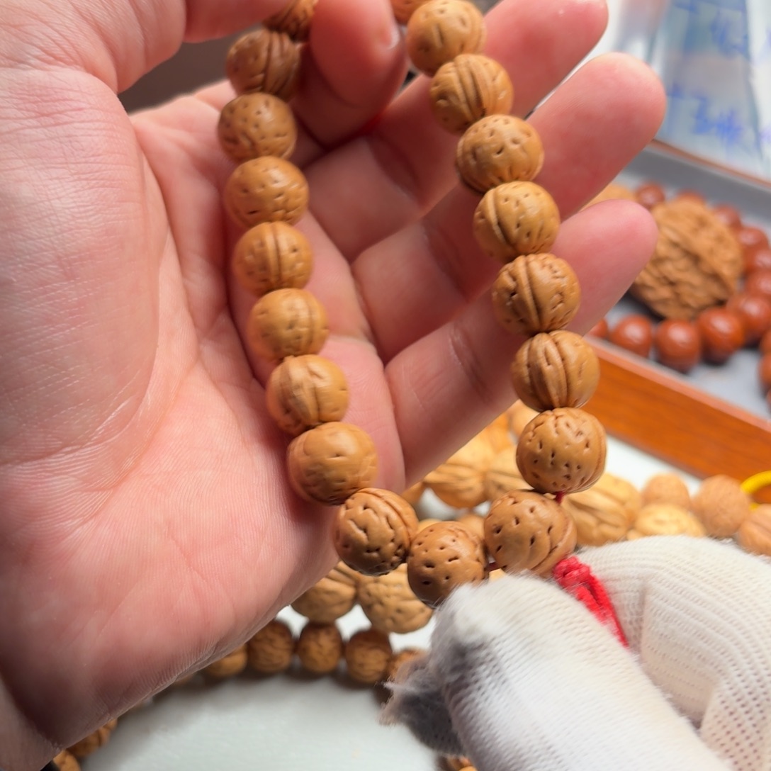 吊坠桃核盘锦奶豆