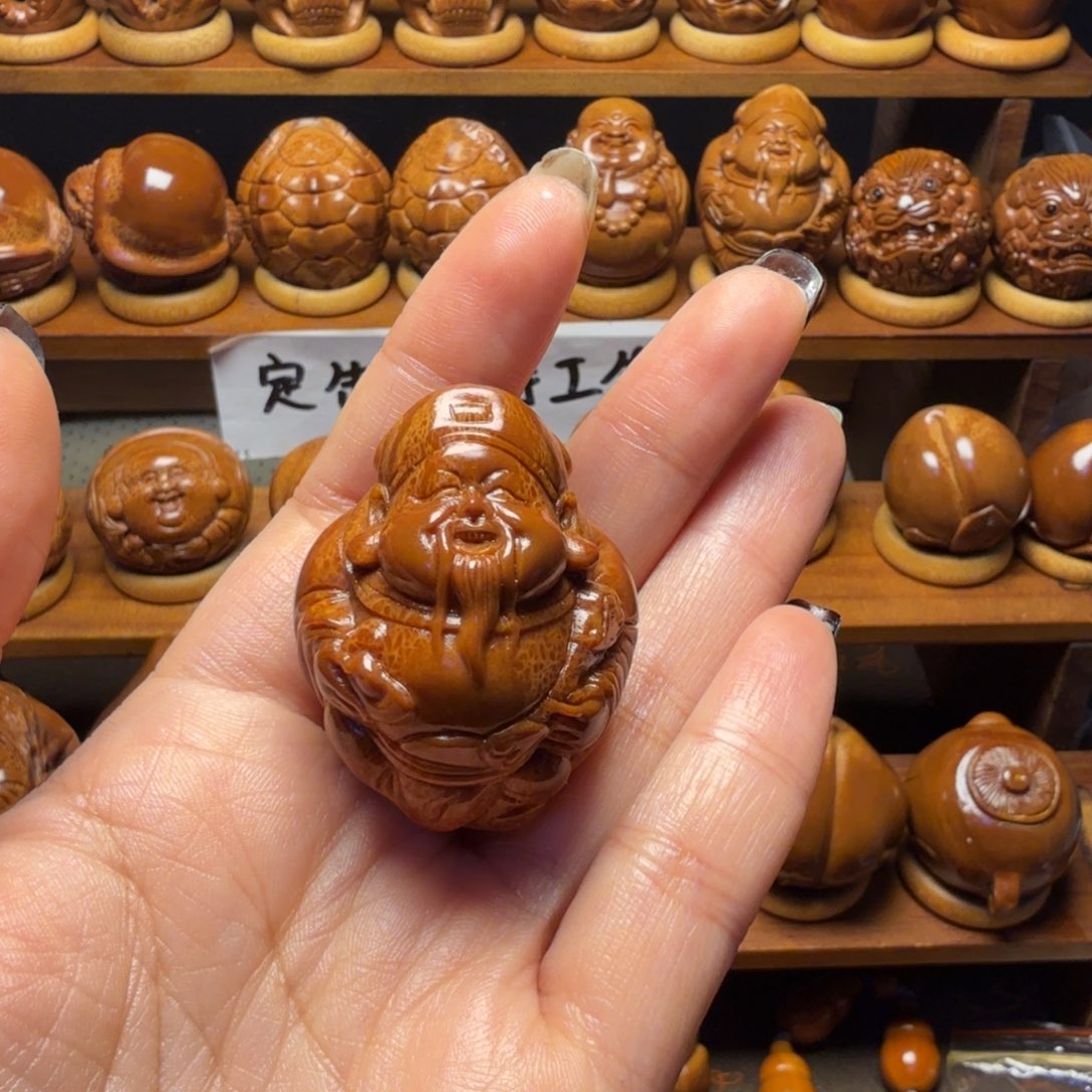 ：****把件橄榄核财神单颗