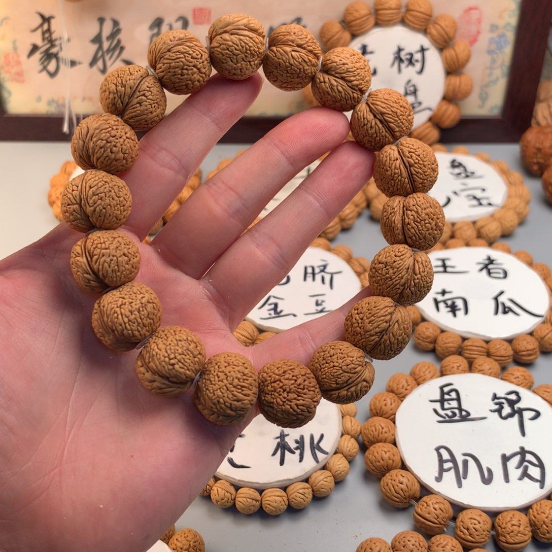 桃核手串龙鳞凤尾