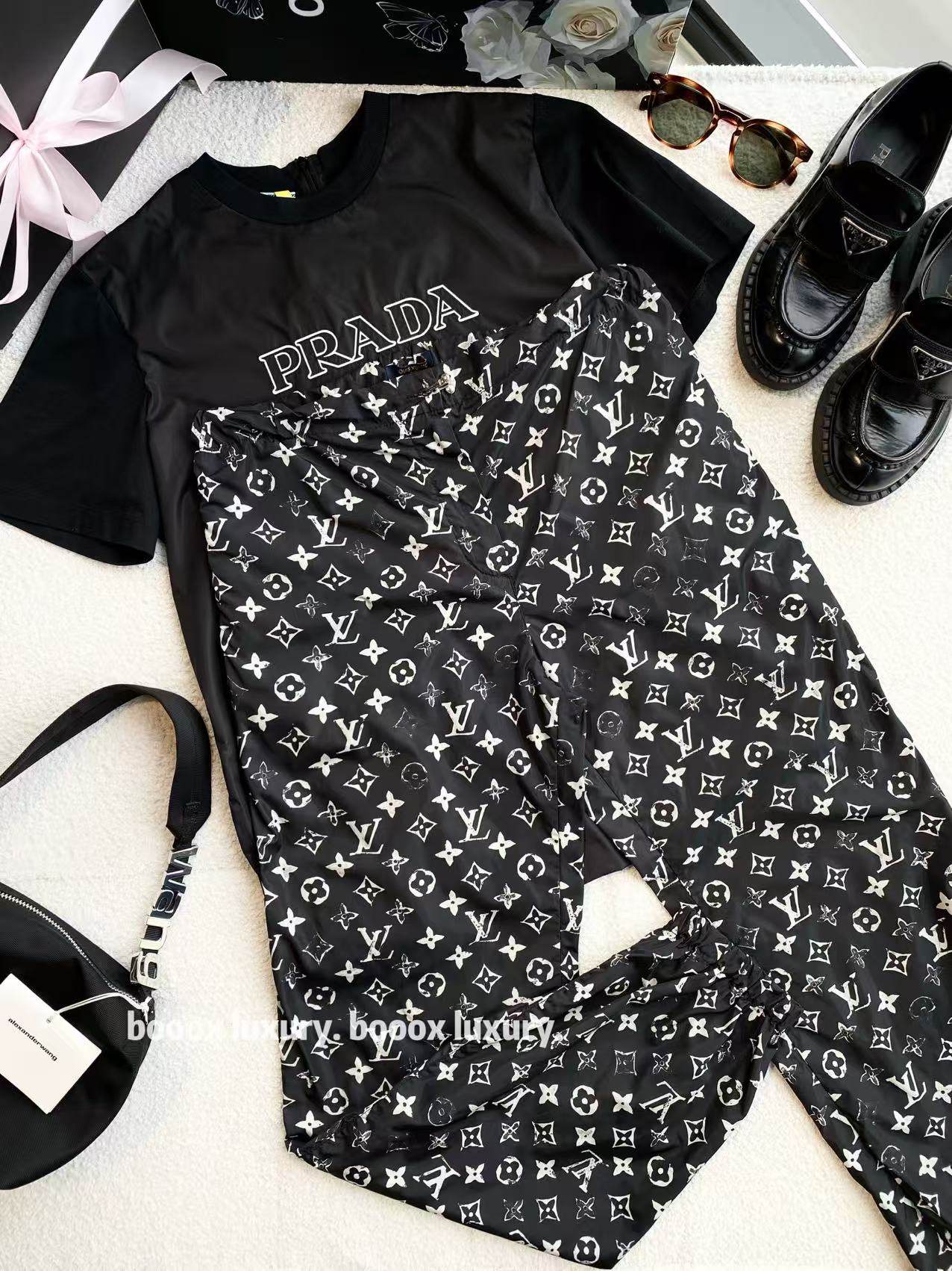 95新 LouisVuitton/路易威登 aa3657 锦纶 老花满印慢跑裤 36码