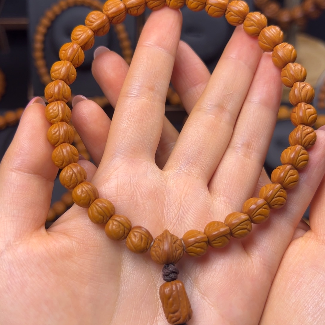 人***士桃核手串野生玉龙脊0.9