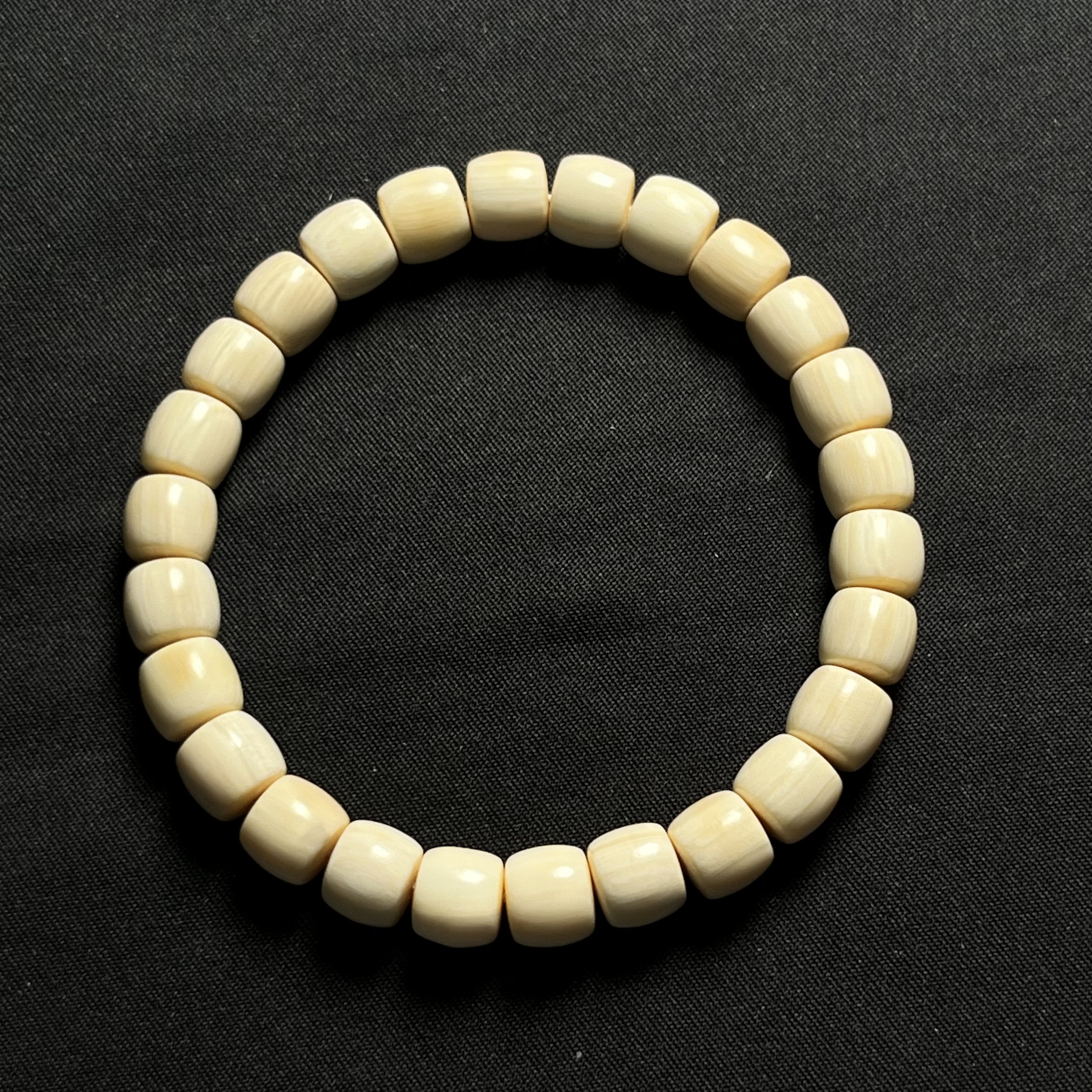 D4102 精选原色直切单圈 约珠径8*对孔7mm 只做天然猛犸牙