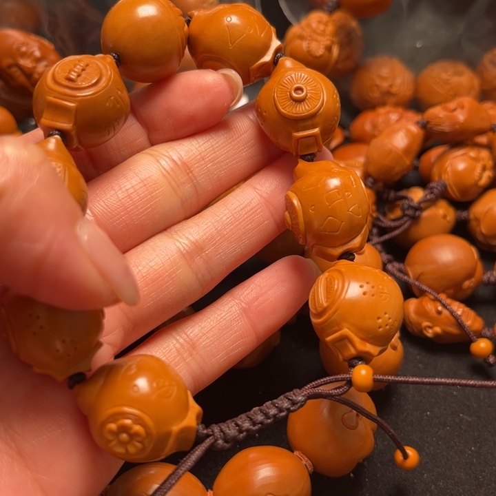 用***0橄榄核吊坠把把壶