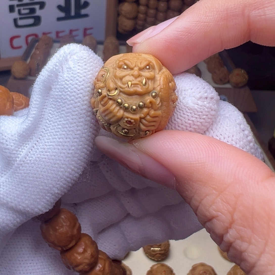 猴头核桃把件镶嵌款不动明王全品有正常封口线