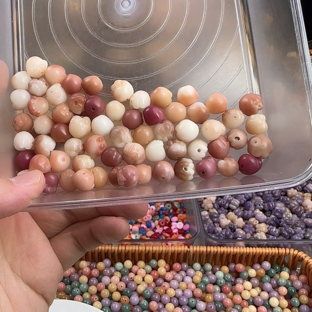 菩提根/象牙果手串微瑕疵卡12粉色熊抓猫爪混64颗