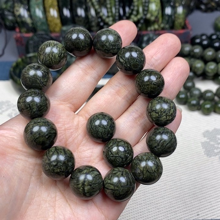 睿***涂未镶嵌蛇纹石玉手链16mm药王石金蛇精品
