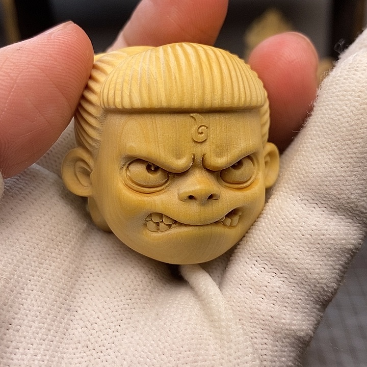 木黄杨木哪吒手把件