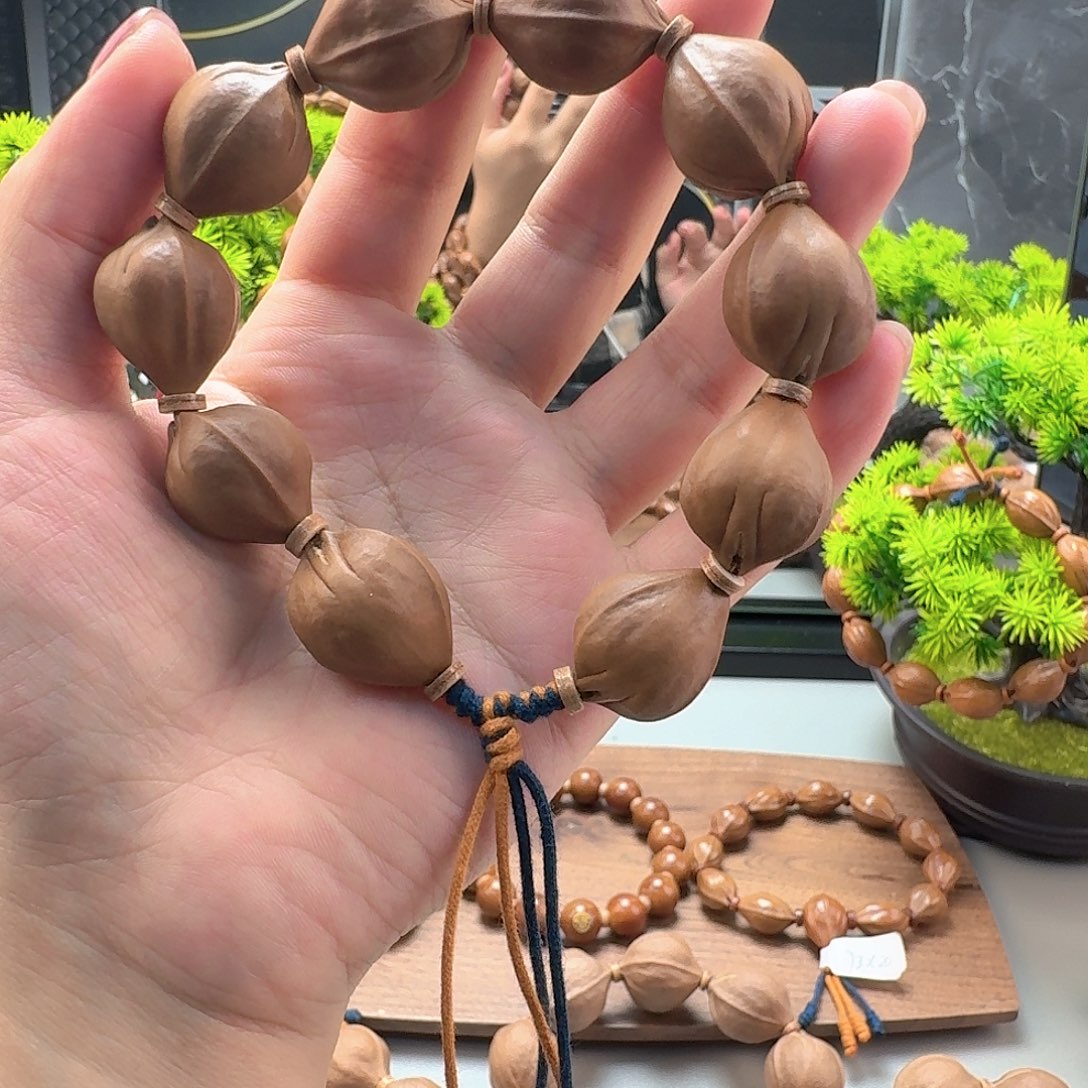 心***᭡橄榄核吊坠三面佛