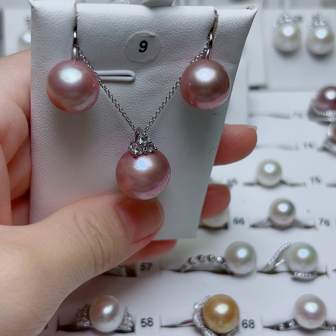 朝***天银S925镶嵌淡水珍珠耳饰