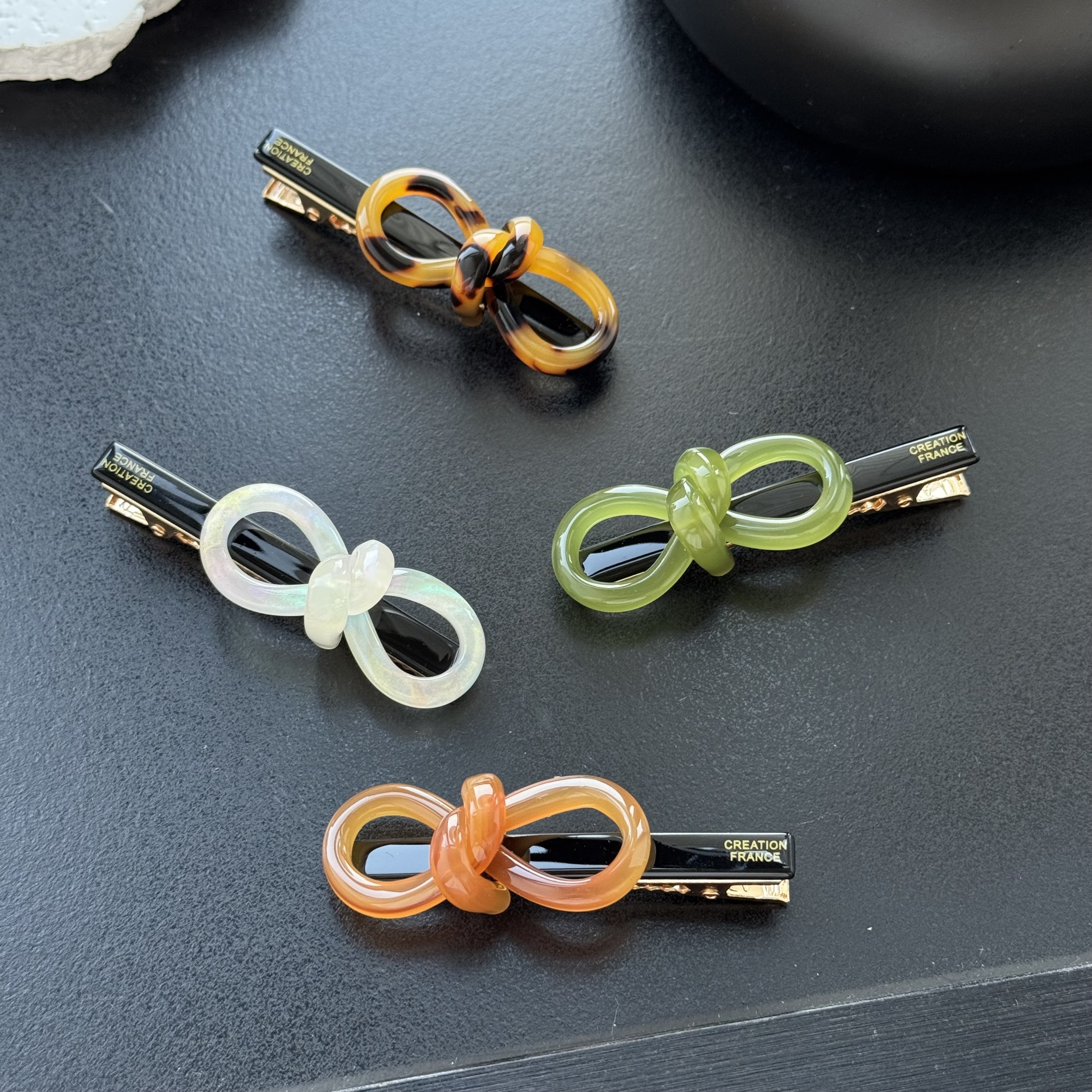 东大门 韩国爆款扭扭蝴蝶结小众高质感经典百搭1077