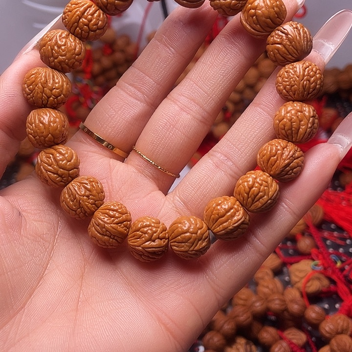 用***2木质类龙纹桃枭手串