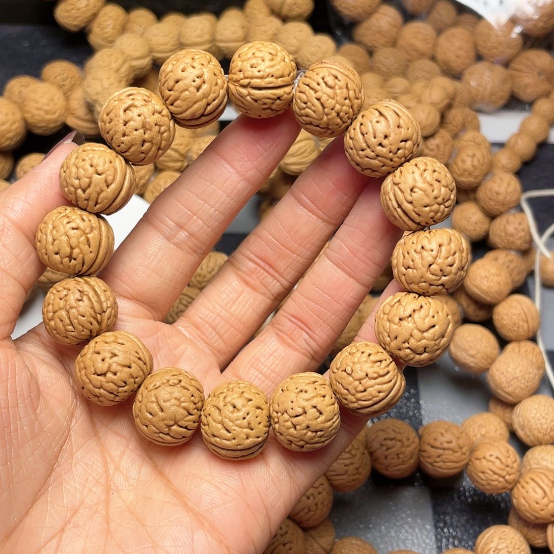 桃核手串歪*…16.5金丹手串