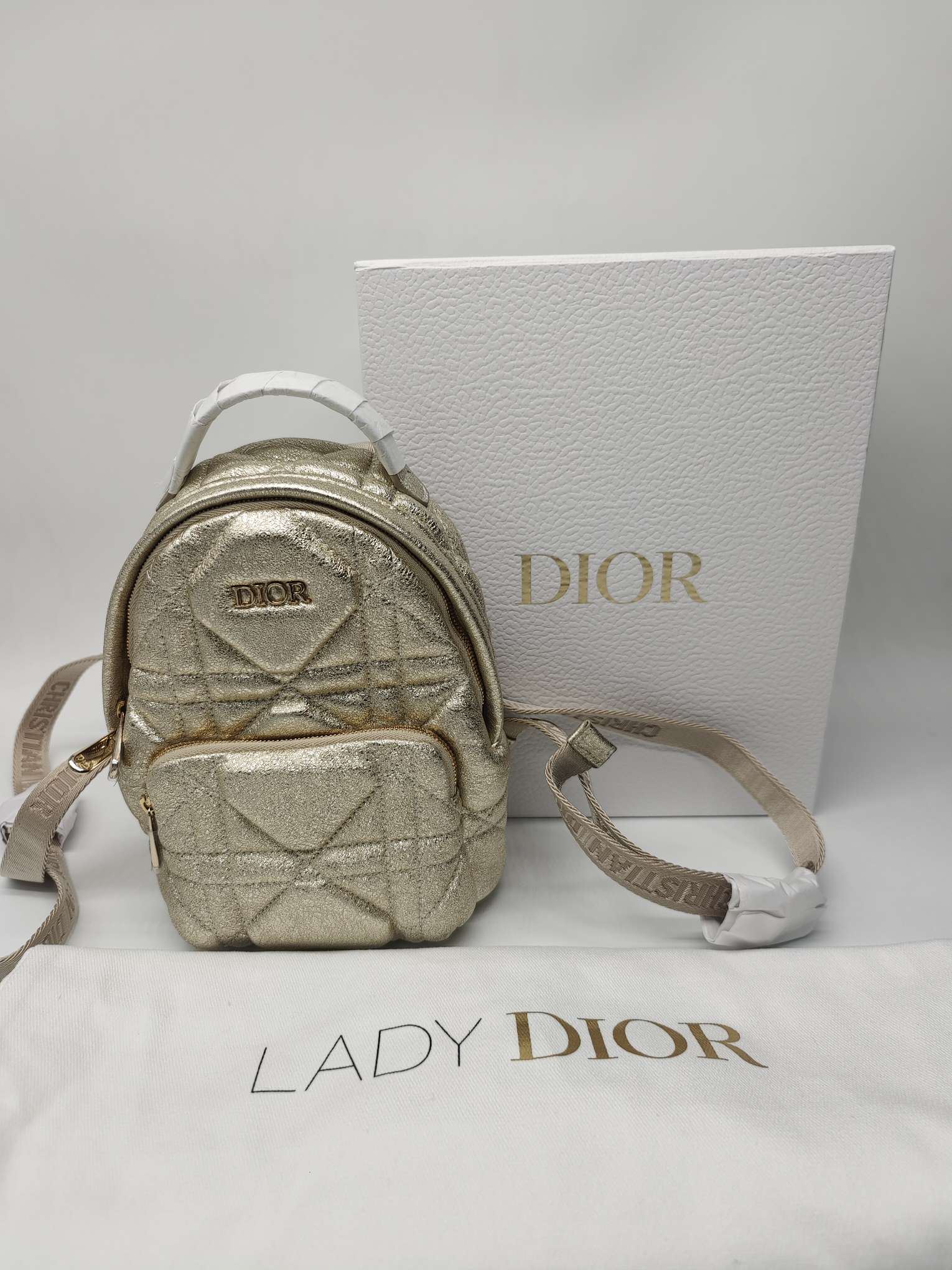 未使用 DIOR/迪奥 Babydior小金包迷你双肩包S24早春金色调16*21