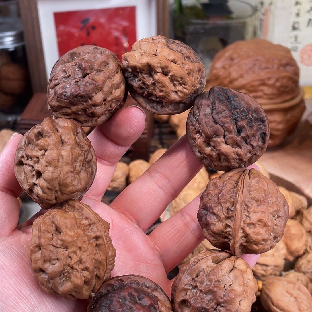 文玩核桃把件财****?团龙手持8颗