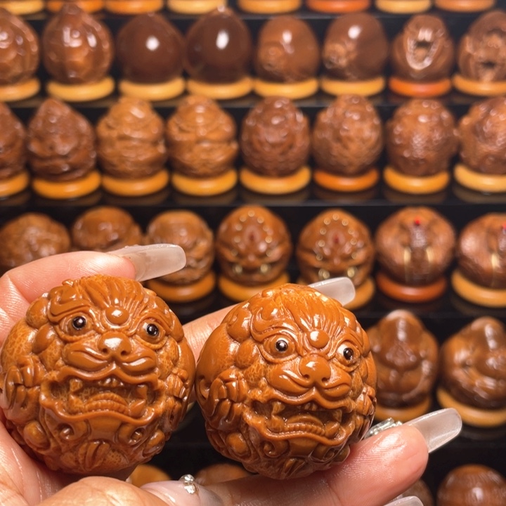 橄榄核把件李**我橄榄雕刻