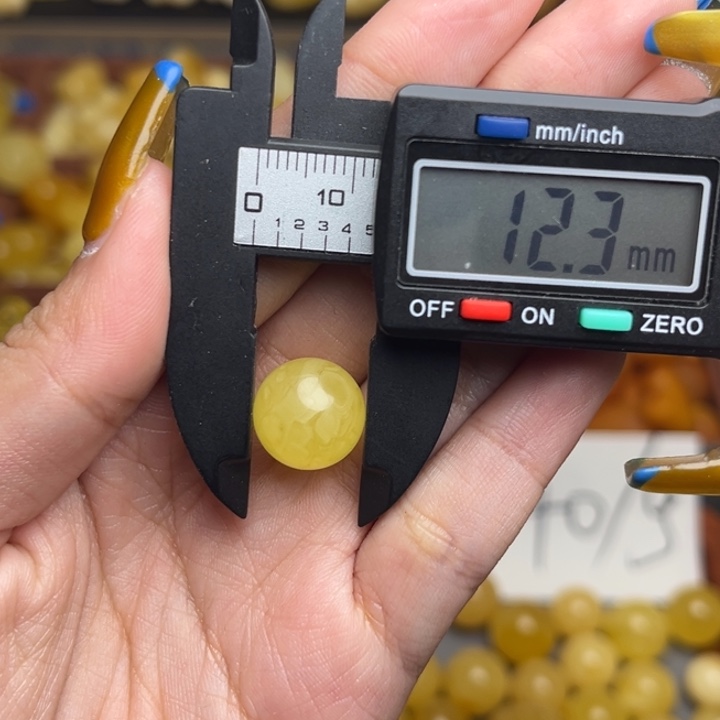 洋***擞蜜蜡未镶嵌珠宝奇石瑕疵放漏圆珠