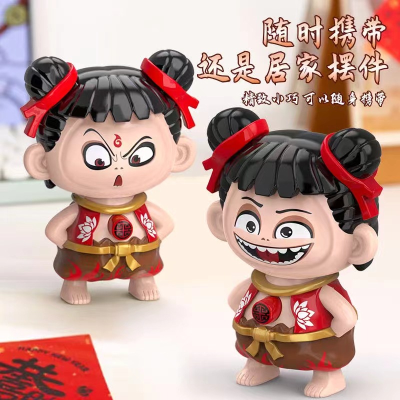 哪吒公仔变脸玩具潮玩玩偶魔童按压变脸表情包创意钥匙扣挂件批发