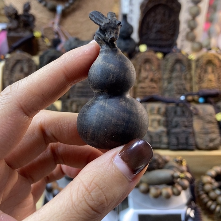 木沨海南莺歌绿奇楠吊坠